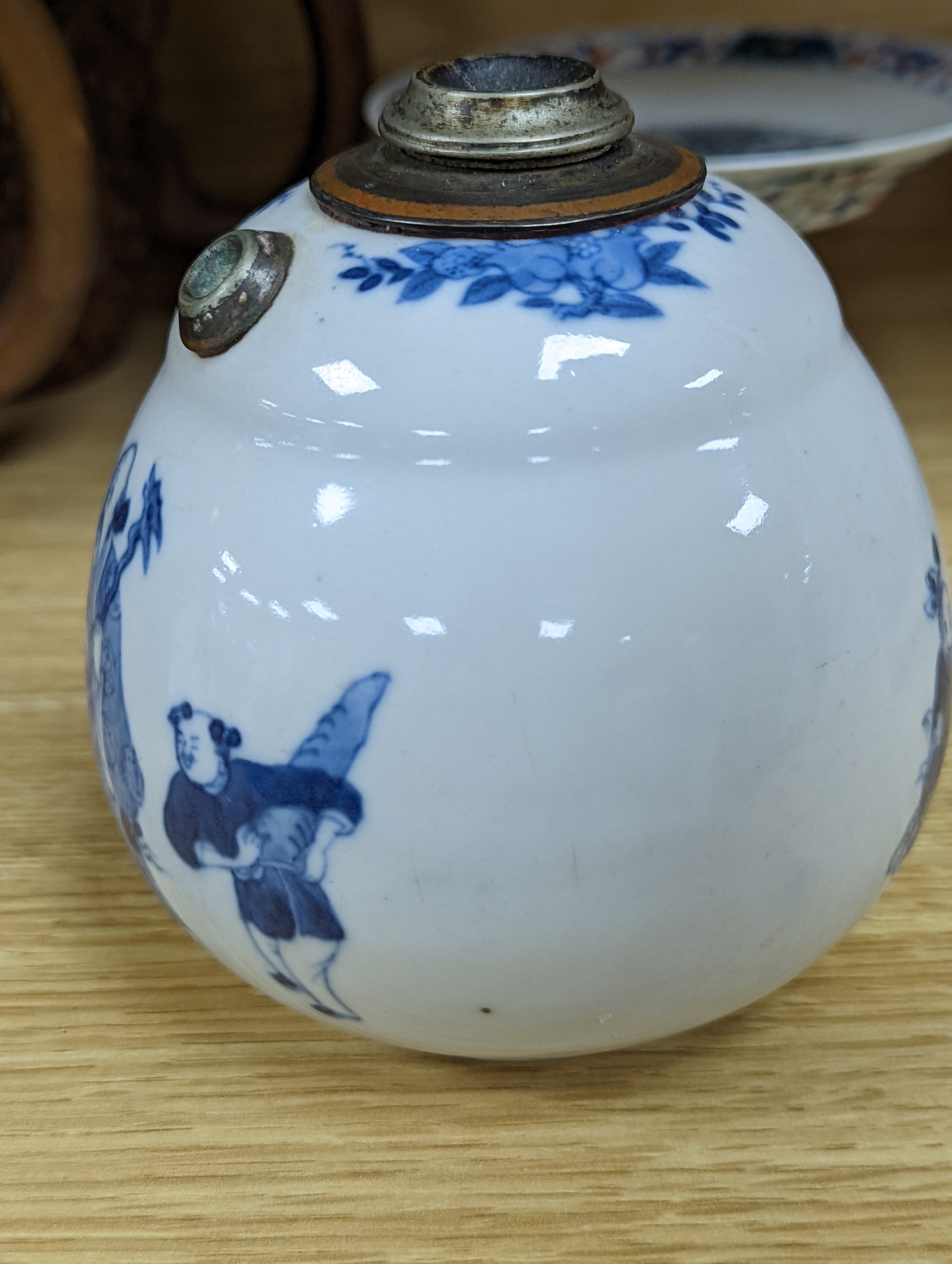 A Chinese blue and white water pipe vessel, a doucai stem dish and a Japanese Imari bowl, 19th century, (3)